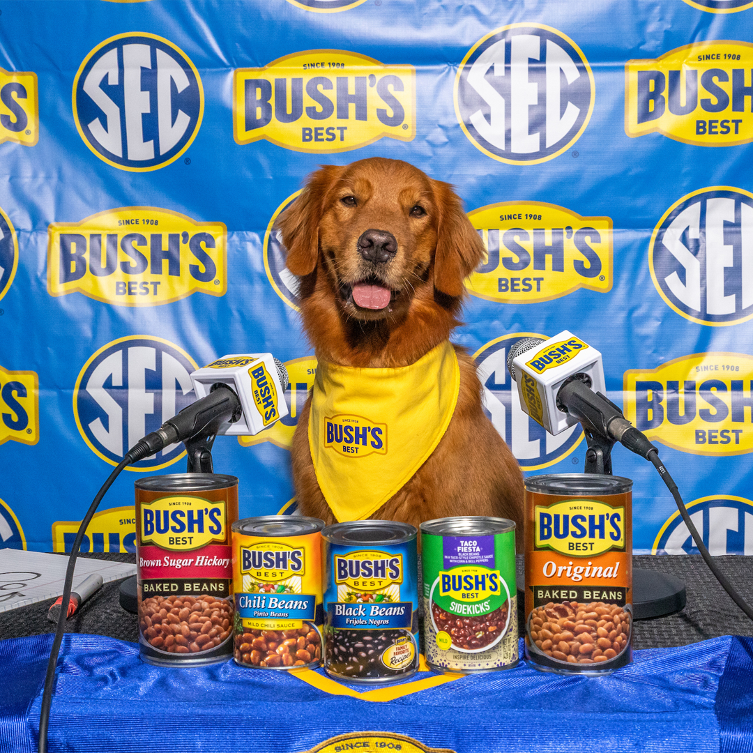Image of Duke in front of Bush's Beans at a SEC themed press conference.